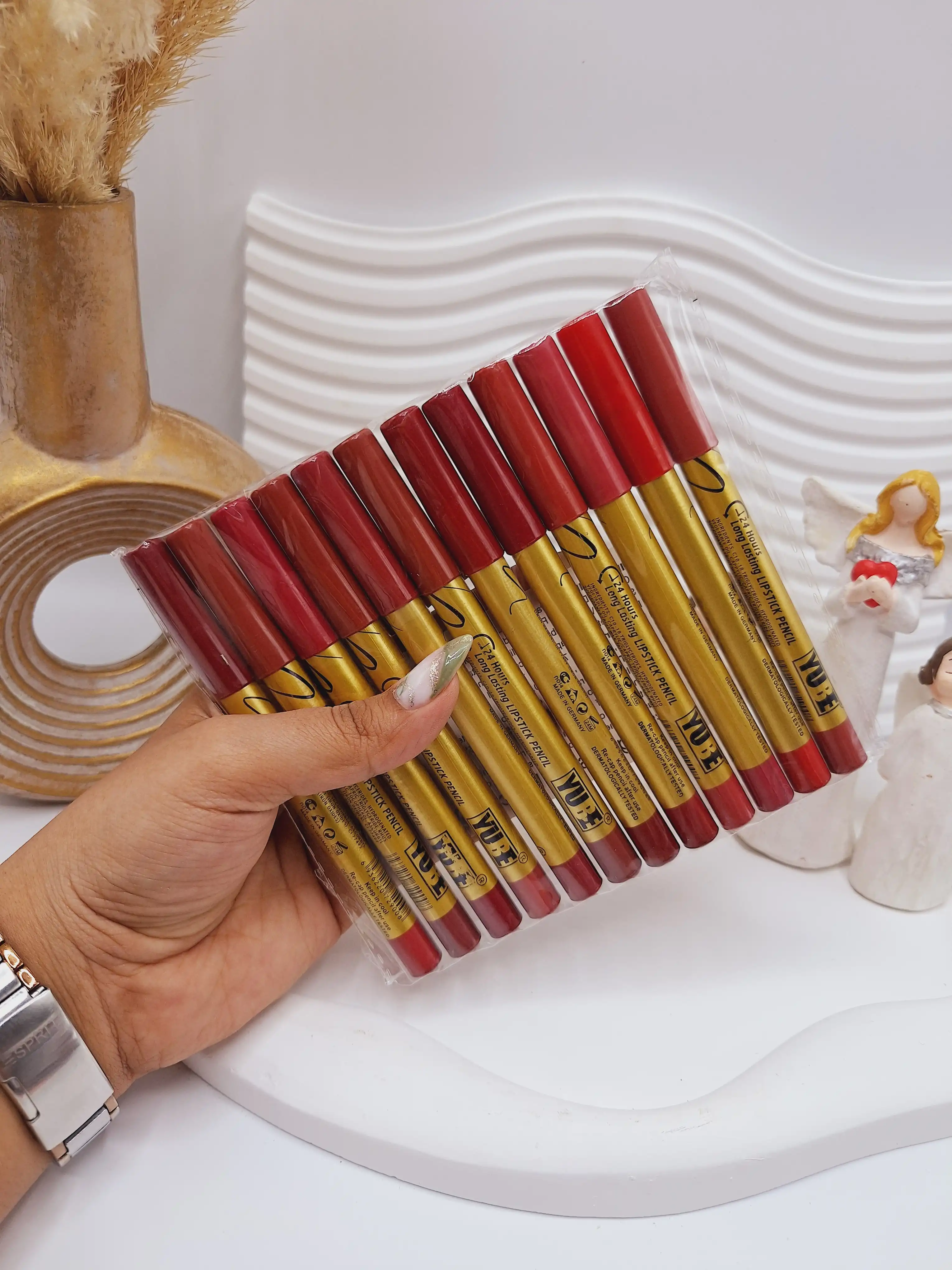 پک 12 تایی رژ مدادی برند YUBE پوکه طلایی کد B