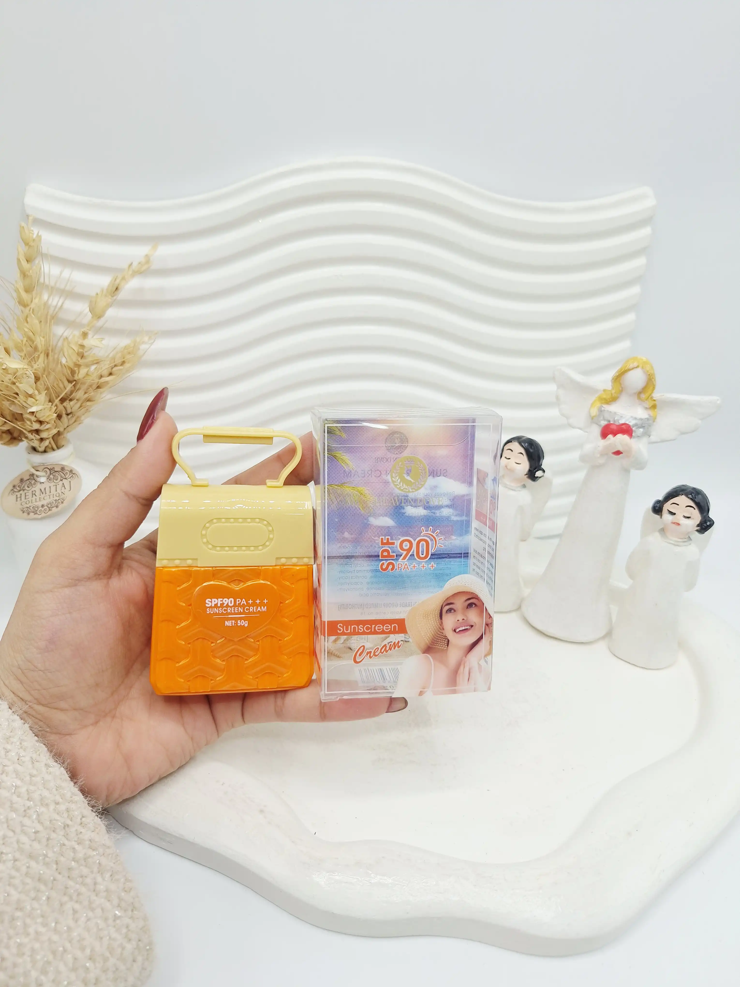 ضد آفتاب بی رنگ صورت و بدن  spf 90 طرح کیف کد 1141